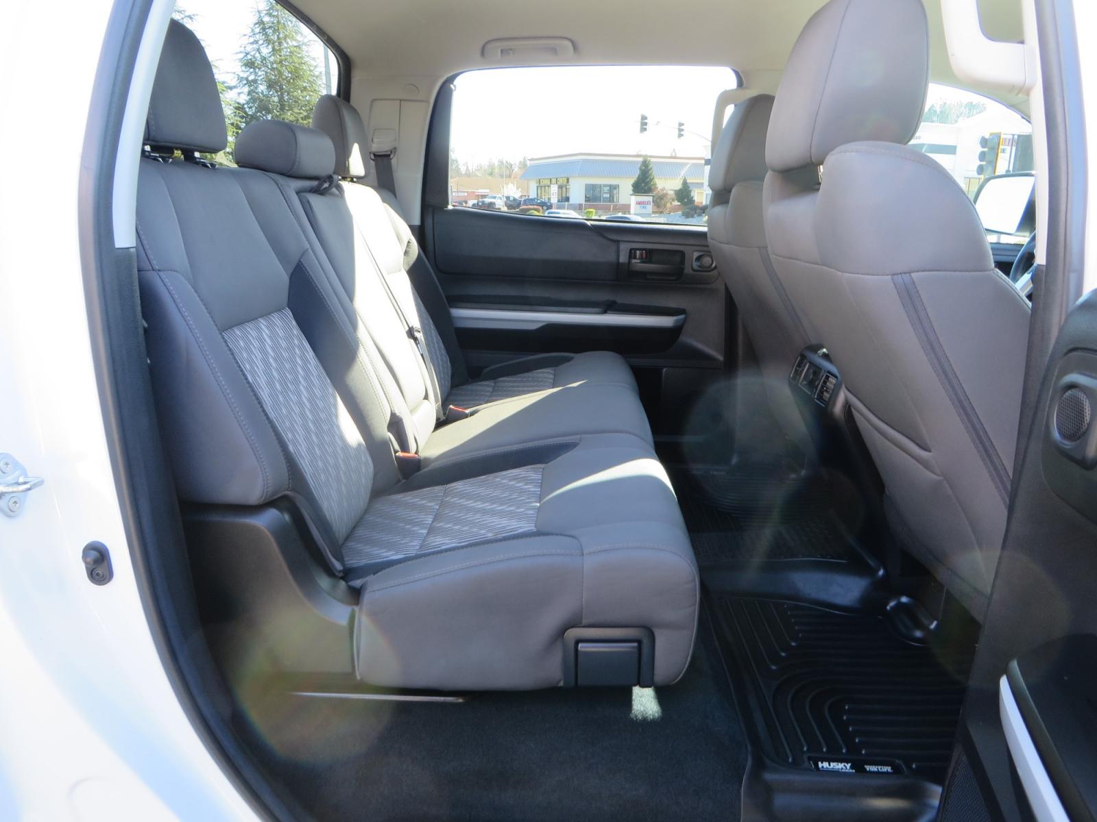 2020 White /GREY Toyota Tundra SR5 (5TFDY5F19LX) with an 5.7L engine, automatic transmission, located at 2630 Grass Valley Highway, Auburn, CA, 95603, (530) 508-5100, 38.937893, -121.095482 - Features - King Off Road adjustable remote reservoir coil overs, King 2.5 adjustable remote reservoir rear shocks, Method Race wheels, Falken Wildpeak tires, Sliders, Bed braces, Borla Exhaust, Husky floor mats, Window tint, and Ram phone mounts. - Photo #50